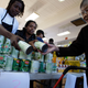 Food supplied by the San Francisco Food Bank for Thanksgiving dinners is distributed by volunteers at a neighborhood food pantry November 20, 2007 in San Francisco, California.